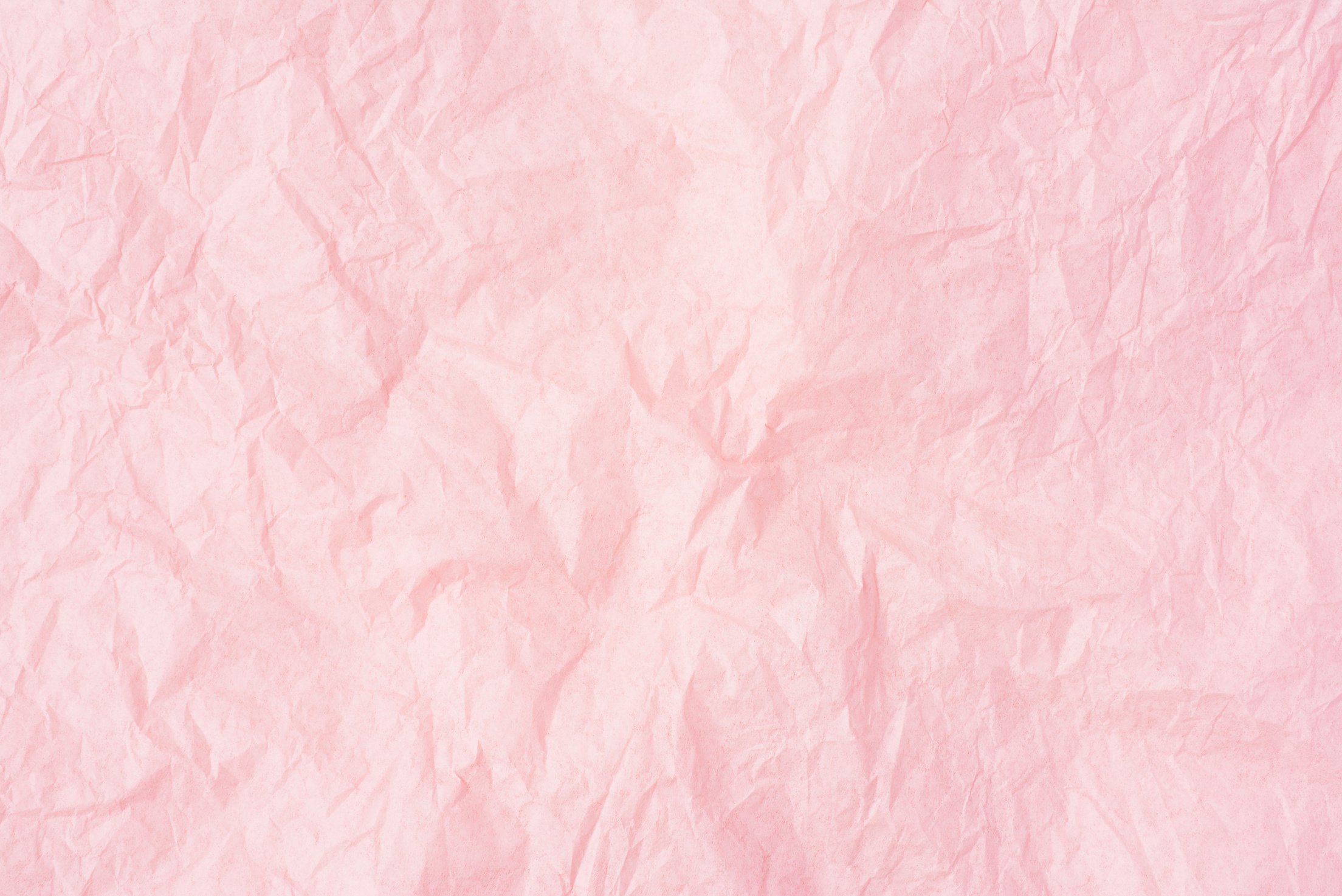 Crumpled Pink Paper Background.